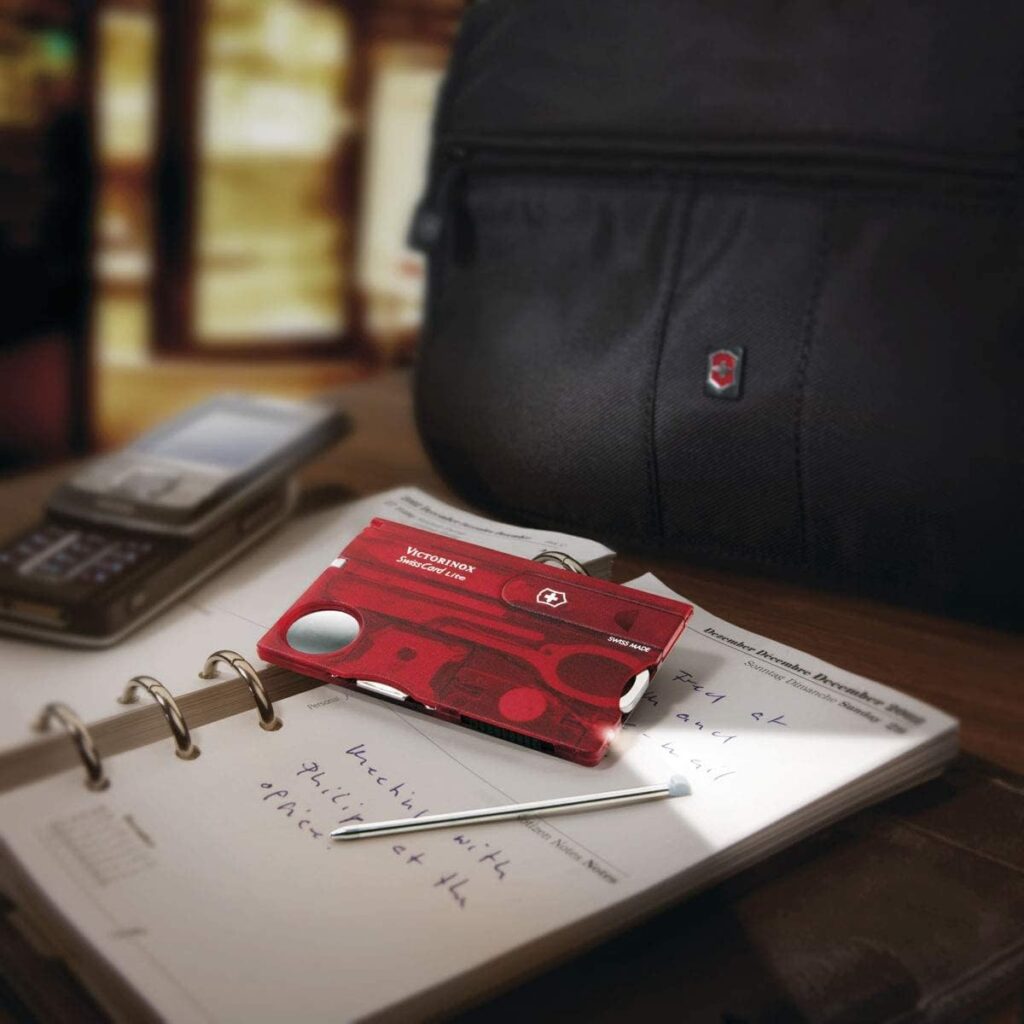 Victorinox Swiss Card Lite Swiss Army Knife, 13 Function Swiss Made Pocket Knife with Magnifying Glass LED and Tweezers - Onyx Victorinox Swiss Card Lite Swiss Army Knife, 13 Function Swiss Made Pocket Knife with Magnifying Glass LED and Tweezers - Onyx